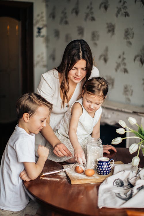 Woman Playing With Her Children