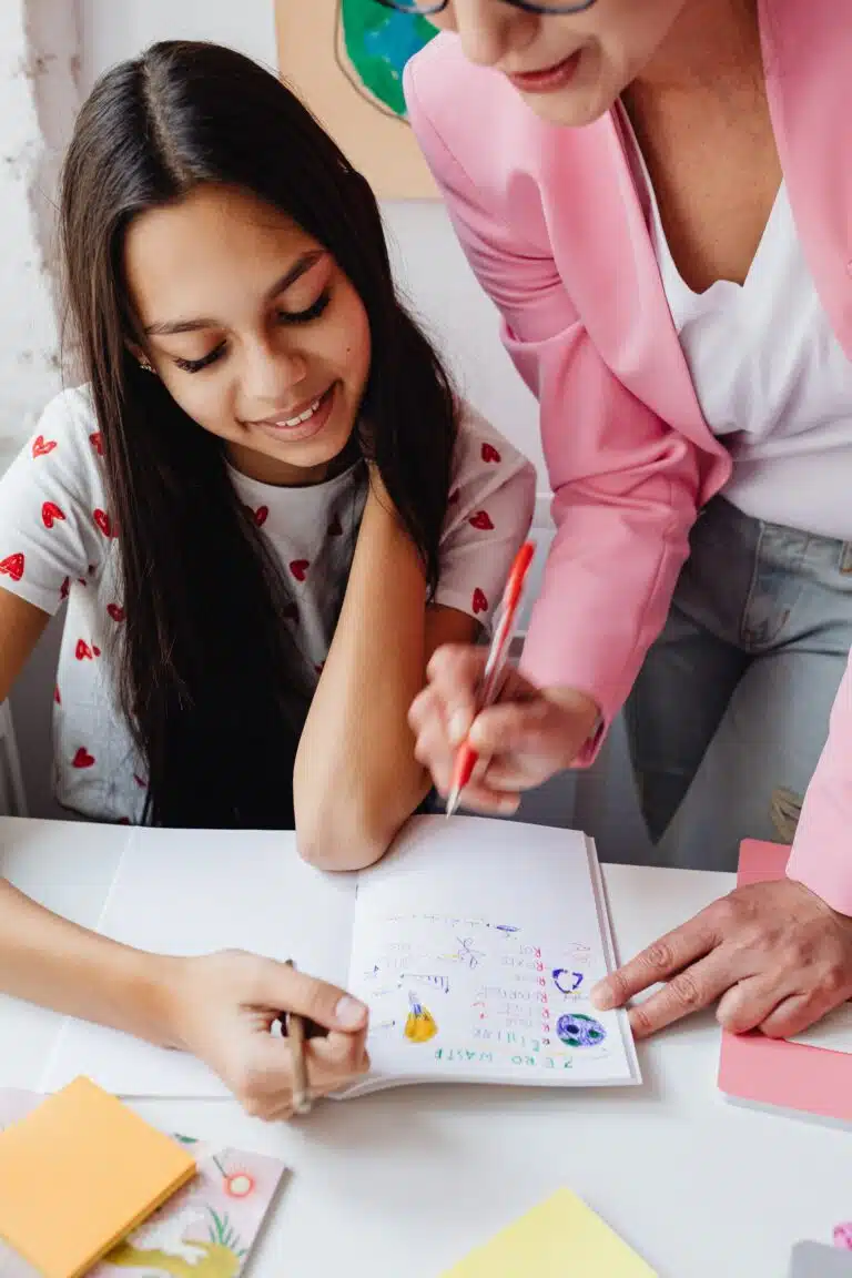 mother teaching teen daughter